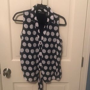 Blue with white dots sleeveless tie bottom top.